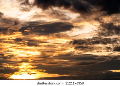 colorful dramatic sky with cloud at sunset.
