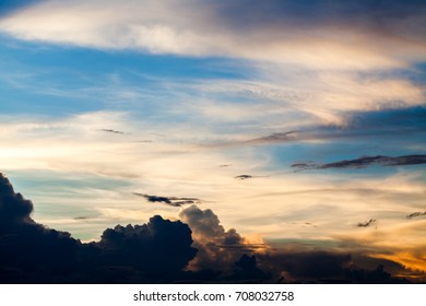 colorful dramatic sky with cloud at sunset.