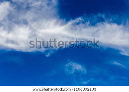 colorful dramatic sky with cloud at sunset.