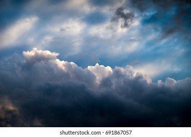 Colorful dramatic sky with dark clouds
