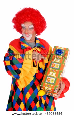 Colorful dressed female holiday clown, happy joyful expression on face, handing over present, gift