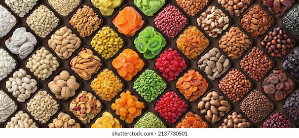 colorful dried fruits, assorted nuts and seeds background. mixed raw food for snacking, top view. - Shutterstock ID 2137730501