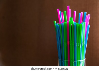Colorful drinking straws for the color background. Abstract a colorful of plastic straws used for drinking water or soft drinks. Selective focus. Copy space