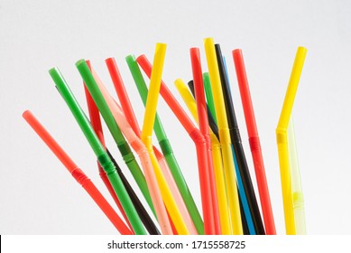 Colorful drinking straws isolated against a white background
