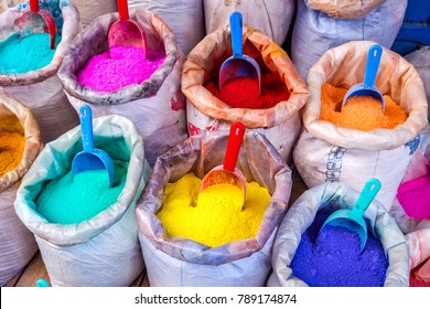 Colorful dry dyes and pigments powders in bags