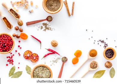 Colorful Dry Herbs And Spices For Cooking Food White Kitchen Table Background Top View Space For Text