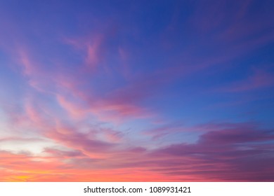 colorful dusk sky on twilight in the evening,majestic sunset with dramatic sunlight on dark blue sky on summer season,idyllic peaceful nature background. - Shutterstock ID 1089931421