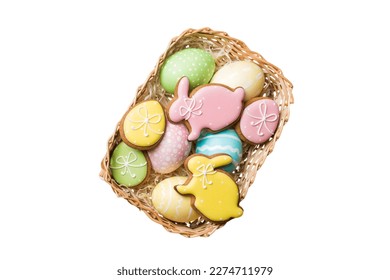 Colorful easter cookies in basket with Multi colors Easter eggs isolated on white background. Pastel color Easter eggs. holiday concept.