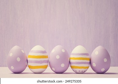 Colorful easter eggs. Background with easter eggs. With retro filter effect. - Shutterstock ID 249275335