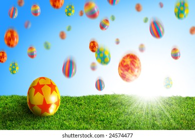 Colorful Easter Eggs Falling Down On A Grass Field