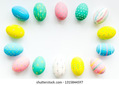 Colorful Easter Eggs Frame On White Background Top View