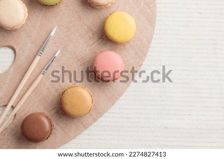 Colorful eco handmade natural macaroon palette on white table. Gift for 8 March, International Women's Day, Valentine Day. Horizontal banner with a copyspace