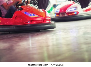 Colorful electric bumper car in autodrom in the fairground attractions at amusement park