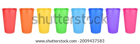 Colorful empty plastic cups set isolated white closeup, color blank drinking glasses, beverage, cocktail, water, tea, juice, coffee mug, disposable takeaway utensil, container mockup, tumbler template
