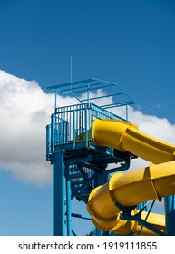 Colorful Empty Water Park Twisted Water Slide Amusement Resort For Children And Family Vacations On A Tropical Day