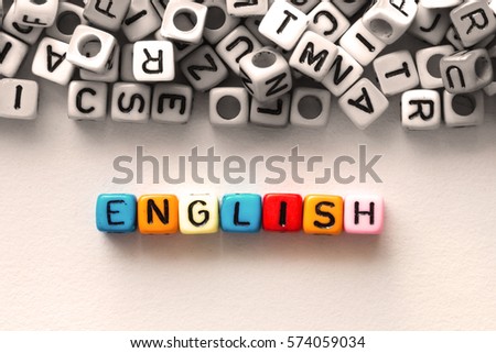 colorful english word cube on white paper background ,English language learning concept