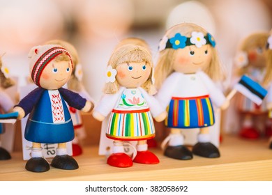 Colorful Estonian Wooden Dolls At Market. Dolls Are The Most Popular Souvenirs From Tallinn And Symbol Of Country's Culture. Estonia