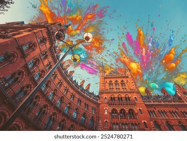 A colorful explosion of paint above an ornate brick building with arched windows, a lamppost, and a clear blue sky. - Powered by Shutterstock