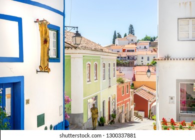 Colorful facades of small portuguese houses in picturesque Monchique, Algarve, Portugal