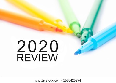 Colorful Felt-tip Pen And 2020 Review Word On White Background.