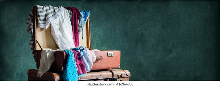 Colorful Female Clothing Scattered On Open Trunk Vintage Style Toned Long Format Turquoise Long Background