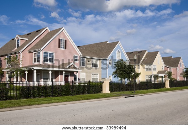 Colorful Fenced Row Houses Blue Sky Stock Photo (Edit Now) 33989494