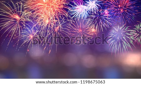 Colorful firework with bokeh background with copy space for New Year celebration, Abstract holiday background