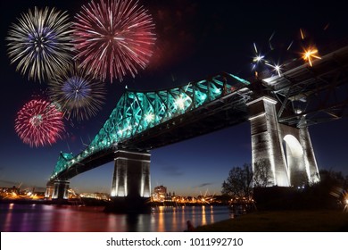 Colorful fireworks explode over bridge, reflection in water. Montreal’s 375th anniversary. luminous colorful interactive Jacques Cartier Bridge. Bridge panoramic colorful silhouette by night. - Powered by Shutterstock