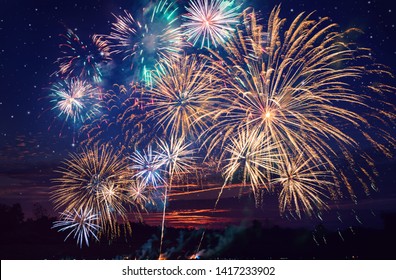 colorful fireworks on the night sky background.