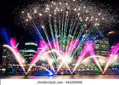 Colorful fireworks on the water at Darling Harbour as part of annual lighting festival Vivid Sydney: Festival of Light, Music and Ideas - Shutterstock ID 441430498