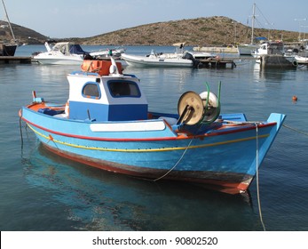 Colorful fishing boat in the harbor of Lipsi island, Greece.