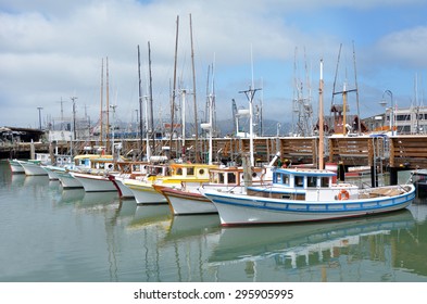Colorful fishing boats in Fisherman's Wharf, San Francisco California, United States of America. No people. Copy space