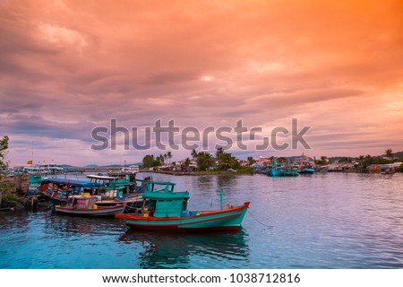 Colorful fishing boats in a harbour. Phu Quoc island, Vietnam.