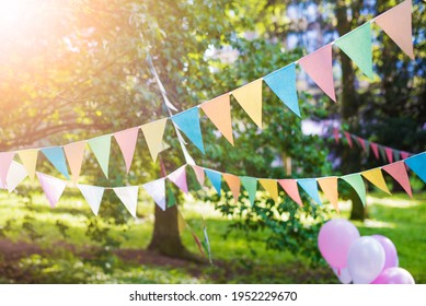 Colorful Flag Festival Celebrate In Garden. Beautiful Colour Flag Triangle.