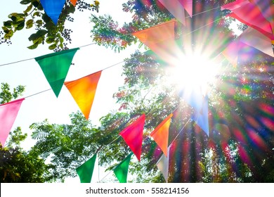 Colorful Flag Festival Celebrate In Garden Blurred Background