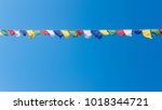Colorful flags with vivid color use as tailsman for safety travel in tibetan on blue sky background