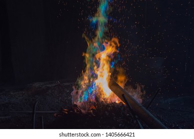 Colorful Flame On Smelting Tin And Copper To Create Bronze As A Raw Material In Gong Production