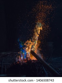 Colorful Flame From Smelting Tin And Copper To Create Bronze As Raw Material In Gong Production (javanese Musical Instrument)