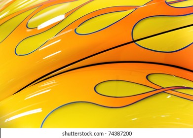 colorful flaming paintwork on a custom hotrod vehicle