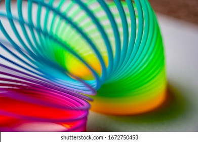 Colorful Flexible Bouncy Plastic Spring Bent Into An Arch