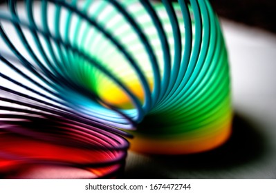 Colorful Flexible Bouncy Plastic Spring Bent Into An Arch