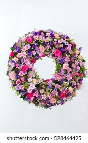 Colorful Flower Arrangement Wreath For Funerals Isolated On White