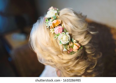 Colorful Flower Hairband On Blonde Woman At Salon