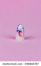 Colorful Foam Earplug On Pink Background