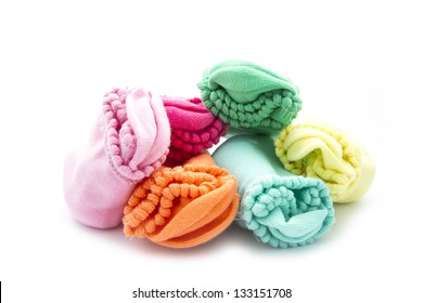 colorful folded socks isolated on white background