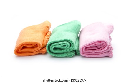 colorful folded socks isolated on white background