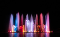 The Colorful Of Fountain On The Lake At Night.
