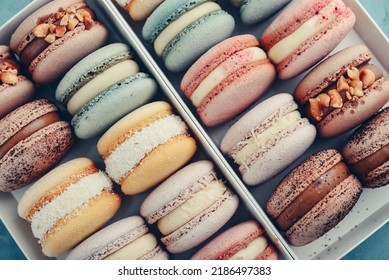 Colorful french macarons background, close up. Tasty sweet color macaroon. Bakery concept.Selective focus.
