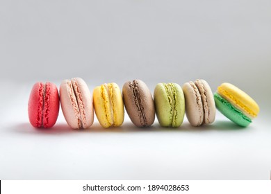 Colorful French Macarons on the grey background