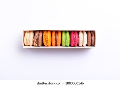 Colorful French Macaroons In Gift Box On White Background. Almond Cookies.Top View, Flat Lay. Valentine's Day Sweet Gift Concept,holiday, Celebration.